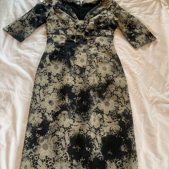 Brand: Alexander McQueen
Category: Dress. Colors: Black and Gold flowers - Picture 11 of 11